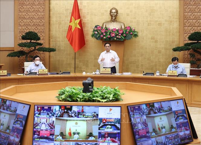 Thủ tướng Phạm Minh Chính: Người dân kiềm chế, không di chuyển tự phát làm lây lan dịch bệnh - Ảnh 1.