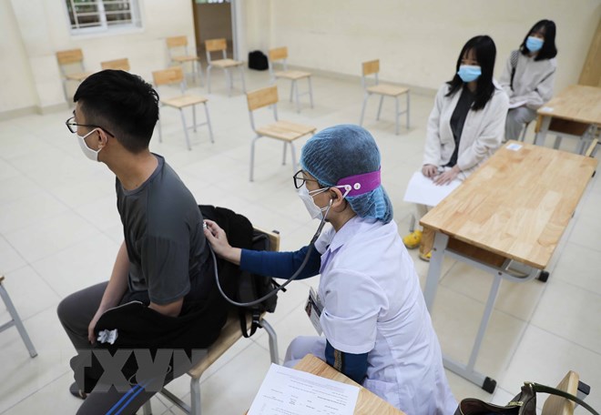 Hà Nội: Phụ huynh yên tâm khi trẻ được tiêm vaccine phòng COVID-19 - Ảnh 5. Hà Nội: Phụ huynh yên tâm khi trẻ được tiêm vaccine phòng COVID-19 - Ảnh 5.